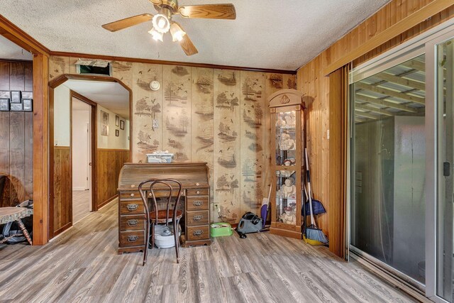 111 School St, Cumberland Furnace, TN 37051 - unfurnished office with wood walls, a textured ceiling, wood finished floors, a ceiling fan, and ornamental molding