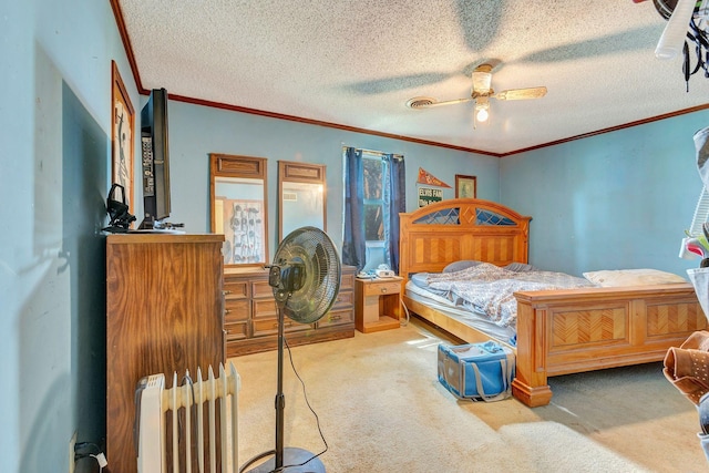 111 School St, Cumberland Furnace, TN 37051 - bedroom with carpet floors, ornamental molding, a ceiling fan, a textured ceiling, and radiator