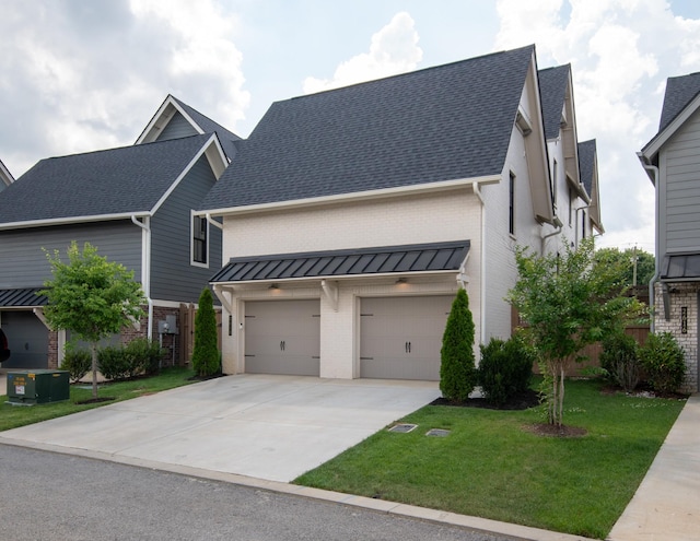 2618 Buckner Ln, Thompsons Station, TN 37179 - view of front facade with brick siding, driveway, a front lawn, and a shingled roof