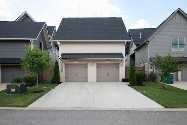 2618 Buckner Ln, Thompsons Station, TN 37179 - view of front facade with brick siding, concrete driveway, a front lawn, an attached garage, and roof with shingles