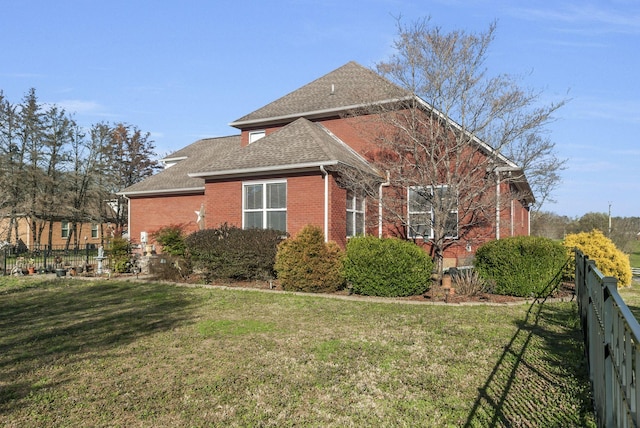 973 Rip Steele Rd, Columbia, TN 38401 - view of side of home with brick siding and roof with shingles
