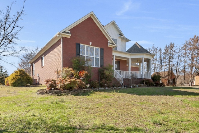 973 Rip Steele Rd, Columbia, TN 38401 - view of front of property featuring covered porch, a front lawn, and brick siding