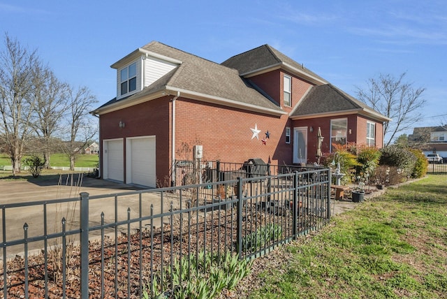 973 Rip Steele Rd, Columbia, TN 38401 - view of side of home featuring brick siding, a shingled roof, and driveway