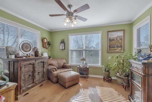 973 Rip Steele Rd, Columbia, TN 38401 - sitting room with healthy amount of natural light, wood finished floors, ceiling fan, and crown molding