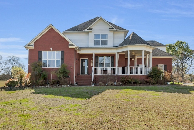 973 Rip Steele Rd, Columbia, TN 38401 - view of front of home featuring covered porch, a front lawn, brick siding, and a shingled roof