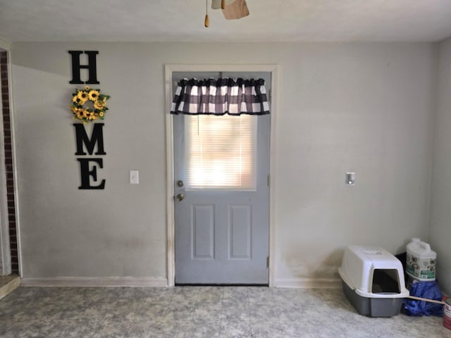 5840 Scottsville Rd, Lafayette, TN 37083 - foyer featuring ceiling fan and baseboards