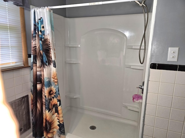 5840 Scottsville Rd, Lafayette, TN 37083 - bathroom with a stall shower and tile walls