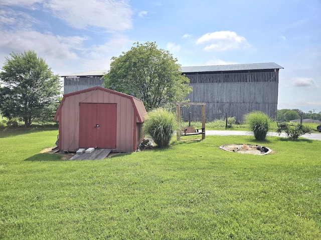 5840 Scottsville Rd, Lafayette, TN 37083 - view of grassy yard with a shed