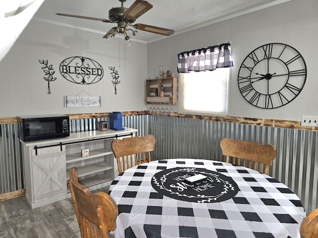 5840 Scottsville Rd, Lafayette, TN 37083 - dining space with wood finished floors, ornamental molding, and a ceiling fan