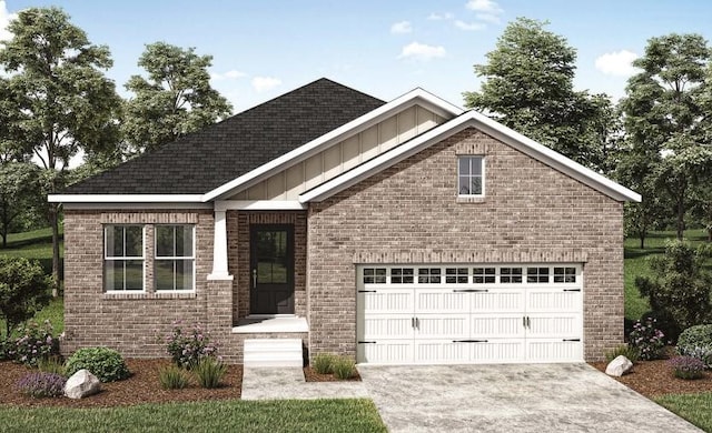 1925 Hildebrand Ln, Columbia, TN 38401 - view of front of property featuring board and batten siding, concrete driveway, a garage, and brick siding