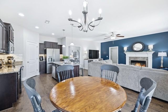 2426 Telford Ln, Murfreesboro, TN 37128 - dining room with ceiling fan, a chandelier, dark wood-type flooring, and recessed lighting