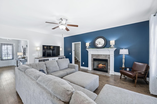 2426 Telford Ln, Murfreesboro, TN 37128 - living area with a ceiling fan, wood finished floors, and a tiled fireplace