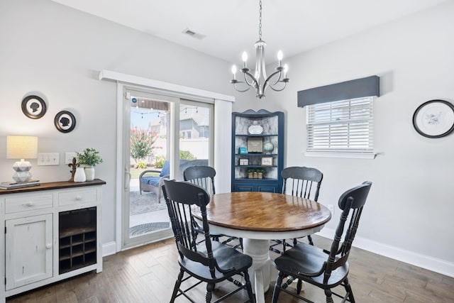 2426 Telford Ln, Murfreesboro, TN 37128 - dining area featuring a chandelier, healthy amount of natural light, and dark wood-style flooring