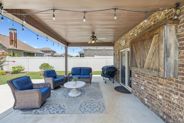 2426 Telford Ln, Murfreesboro, TN 37128 - fenced backyard featuring a grill, an outdoor hangout area, ceiling fan, and a patio