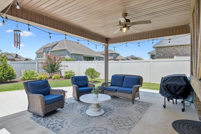 2426 Telford Ln, Murfreesboro, TN 37128 - fenced backyard featuring outdoor lounge area, a patio, ceiling fan, and area for grilling