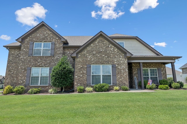 2426 Telford Ln, Murfreesboro, TN 37128 - view of front facade featuring brick siding and a front yard