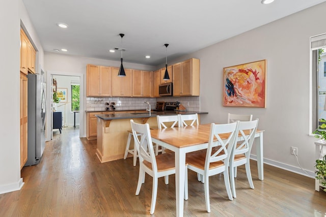 1035 Chester Ave Unit 10, Nashville, TN 37206 - dining area with wood finished floors and recessed lighting