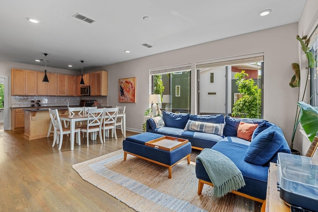 1035 Chester Ave Unit 10, Nashville, TN 37206 - living area featuring light wood-type flooring and recessed lighting