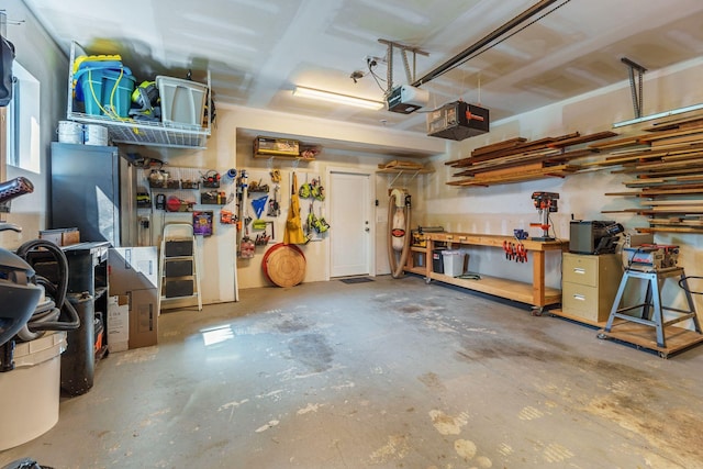 1035 Chester Ave Unit 10, Nashville, TN 37206 - garage featuring a garage door opener and a workshop area