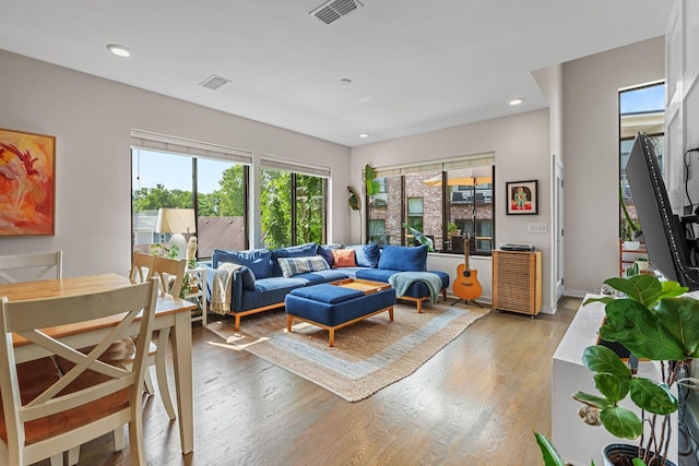1035 Chester Ave Unit 10, Nashville, TN 37206 - living room with light wood-style floors and recessed lighting