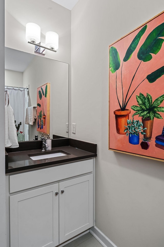 1035 Chester Ave Unit 10, Nashville, TN 37206 - bathroom with vanity and baseboards