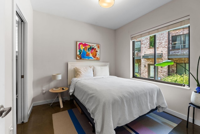 1035 Chester Ave Unit 10, Nashville, TN 37206 - bedroom with baseboards and concrete floors