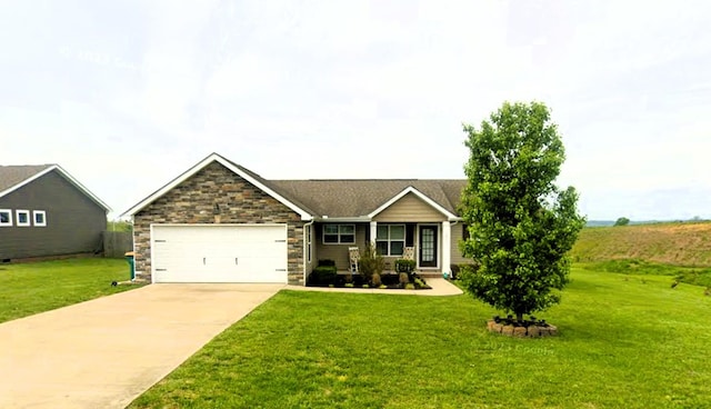 1011 Mccormick Xing, Spring Hill, TN 37174 - view of front facade featuring a garage, concrete driveway, a front lawn, and stone siding
