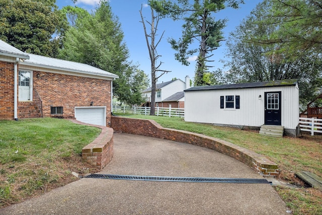 2641 Buckner Rd, Thompsons Station, TN 37179 - view of patio / terrace with an attached garage, driveway, and entry steps