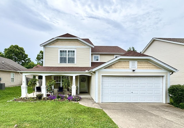 3525 Chandler Cove Way, Antioch, TN 37013 - view of front of property with a porch, driveway, an attached garage, a front yard, and roof with shingles