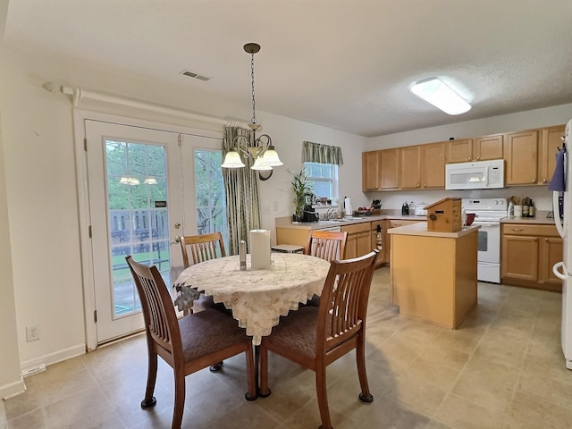 3525 Chandler Cove Way, Antioch, TN 37013 - dining area featuring a chandelier and light tile patterned floors