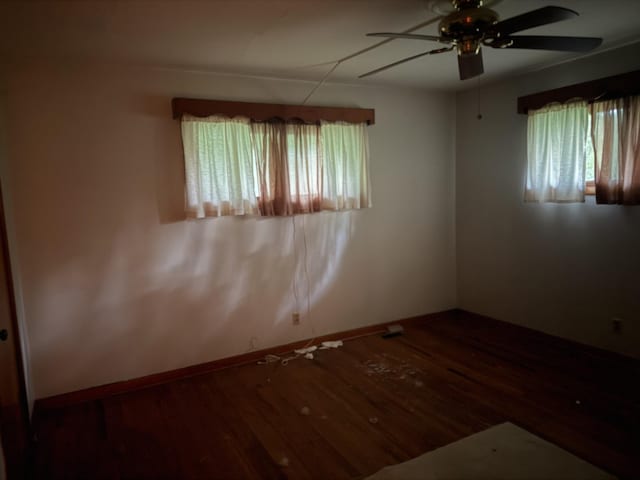 887 Elwood Dr, Clarksville, TN 37040 - empty room with a ceiling fan and wood finished floors