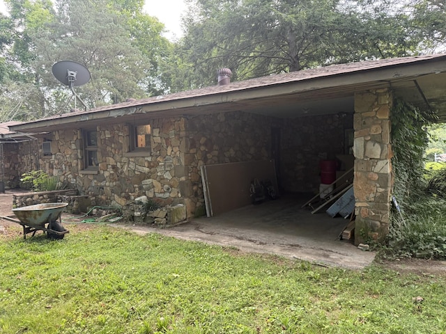 887 Elwood Dr, Clarksville, TN 37040 - view of side of property featuring stone siding and a lawn