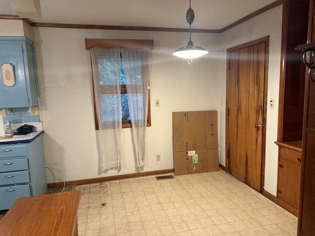 887 Elwood Dr, Clarksville, TN 37040 - unfurnished dining area with light floors and crown molding
