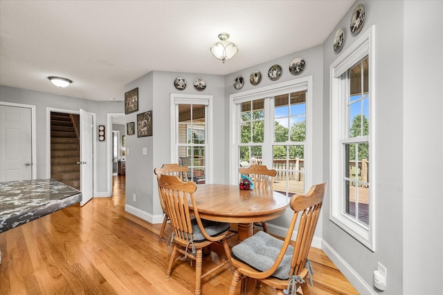 125 Clarence Lee Rd, Lancing, TN 37770 - dining area featuring baseboards and light wood-style flooring