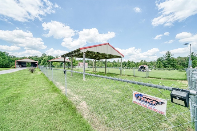125 Clarence Lee Rd, Lancing, TN 37770 - view of yard with a carport, driveway, and a view of countryside