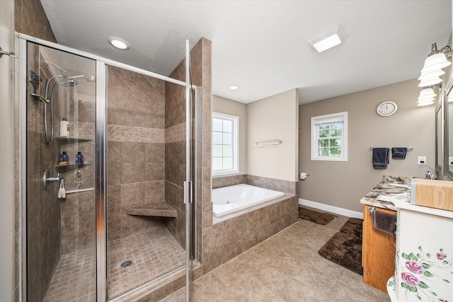 125 Clarence Lee Rd, Lancing, TN 37770 - bathroom featuring a bath, vanity, a stall shower, and tile patterned floors