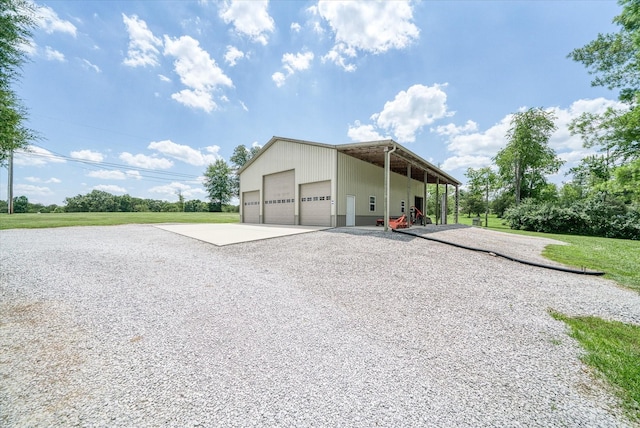125 Clarence Lee Rd, Lancing, TN 37770 - view of outbuilding with gravel driveway