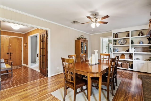 6002 Temple Rd, Nashville, TN 37221 - dining room with a ceiling fan, ornamental molding, and french doors