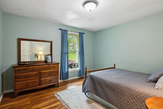 6002 Temple Rd, Nashville, TN 37221 - bedroom featuring dark wood finished floors and baseboards