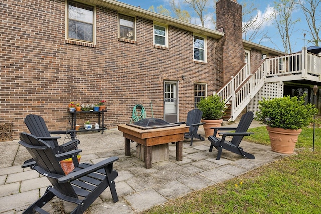 6002 Temple Rd, Nashville, TN 37221 - view of patio with a fire pit, stairway, and a deck