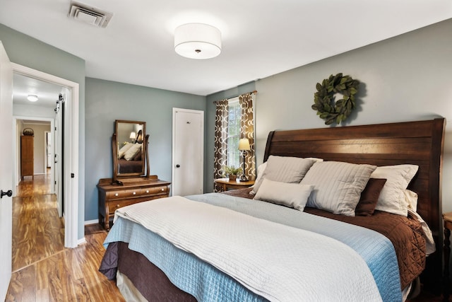 6002 Temple Rd, Nashville, TN 37221 - bedroom featuring wood finished floors and baseboards