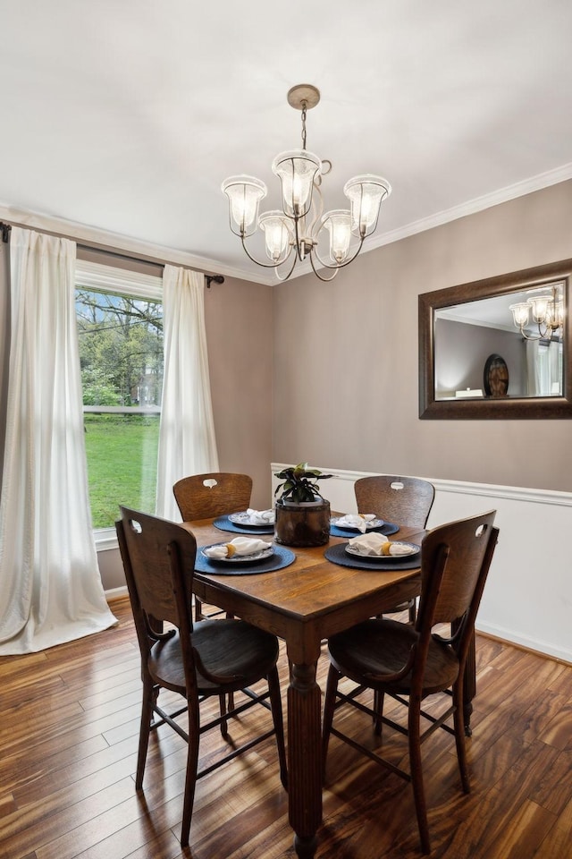6002 Temple Rd, Nashville, TN 37221 - dining room featuring a chandelier, crown molding, and dark wood-style floors