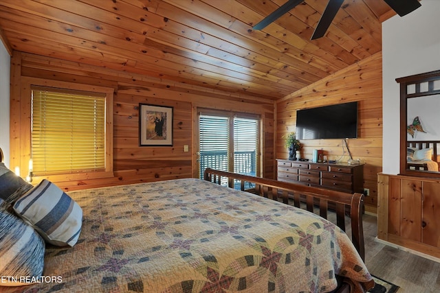849 Golf View Blvd, Pigeon Forge, TN 37863 - bedroom with vaulted ceiling, wooden walls, wood finished floors, and wood ceiling