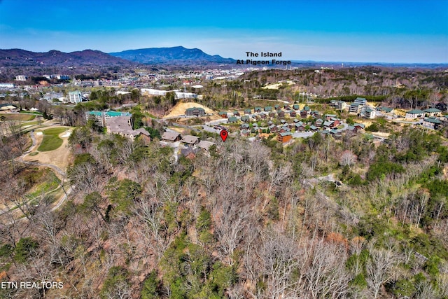 849 Golf View Blvd, Pigeon Forge, TN 37863 - aerial overview of property's location featuring a mountain backdrop and nearby suburban area