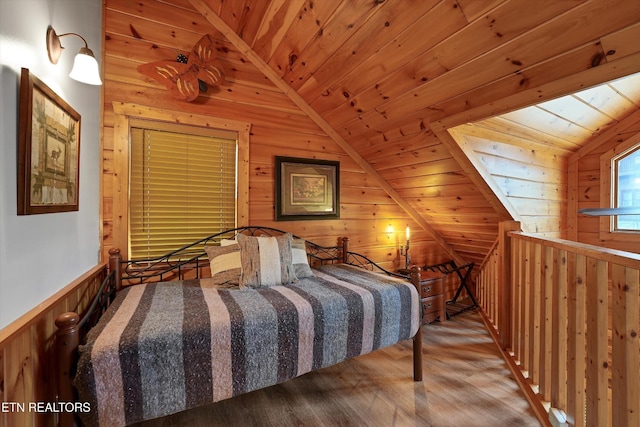 849 Golf View Blvd, Pigeon Forge, TN 37863 - bedroom with wood walls, wood ceiling, wood finished floors, lofted ceiling, and a wainscoted wall