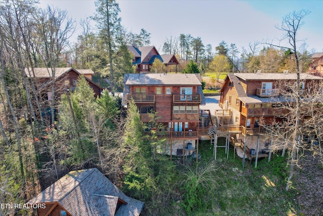 849 Golf View Blvd, Pigeon Forge, TN 37863 - back of house featuring a balcony and a residential view