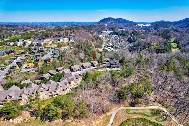 849 Golf View Blvd, Pigeon Forge, TN 37863 - aerial overview of property's location with a mountainous background and nearby suburban area