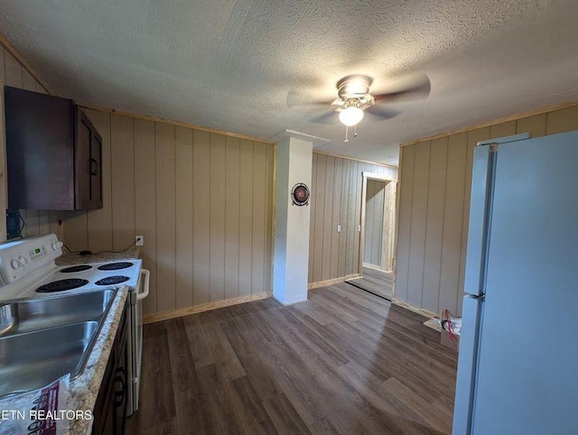 1014 Frank Campbell Rd, Jamestown, TN 38556 - kitchen featuring white appliances, dark wood finished floors, a ceiling fan, and a textured ceiling