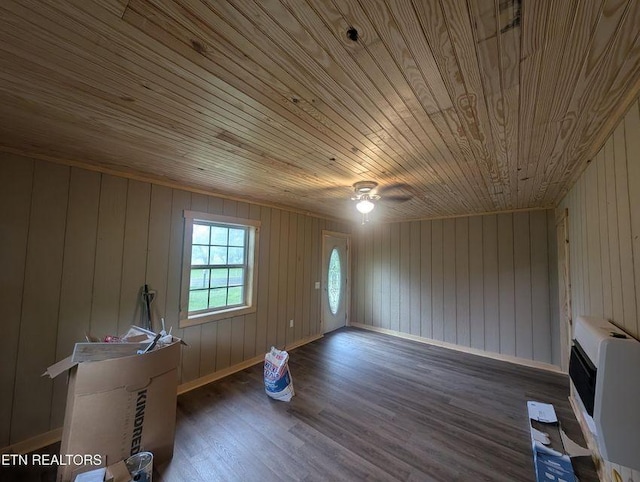 1014 Frank Campbell Rd, Jamestown, TN 38556 - unfurnished living room with heating unit, wood ceiling, wood finished floors, ceiling fan, and wooden walls