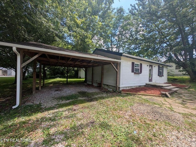 1014 Frank Campbell Rd, Jamestown, TN 38556 - exterior space featuring driveway and a carport